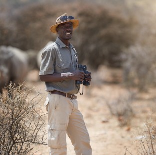 portrait of a confident game ranger looking at a g 2025 04 06 10 15 06 utc Custom