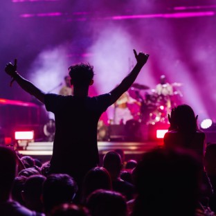 energetic fans reveling in a live concert experien 2025 04 03 20 04 34 utc Custom Custom